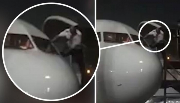 طياران يهربان من طائرة عليها ركاب يشتبه إصابتهم بكورونا (فيديو)