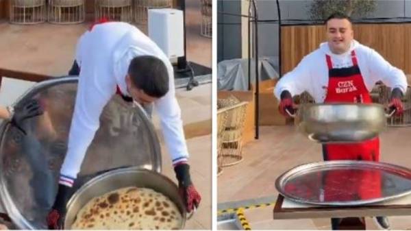 لحظة سقوط الشيف بوراك بإناء كبير أمام مطعمه في دبي (فيديو)